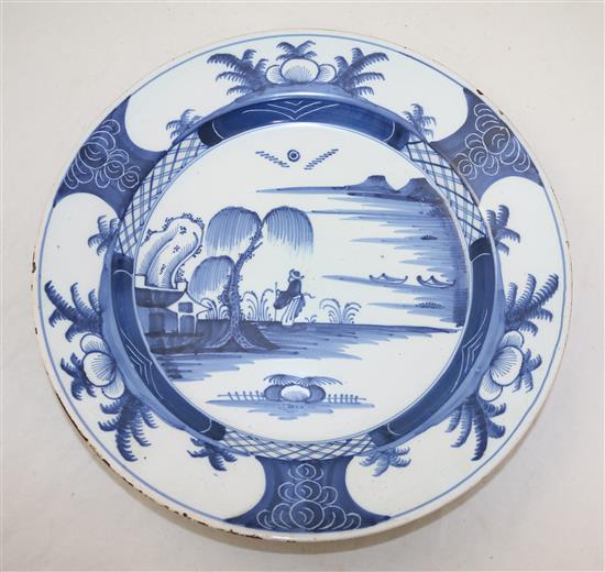 An English delft blue and white charger and a Dutch delft charger, mid 18th century, diam. 35cm